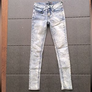 BDG acid wash skinny jeans